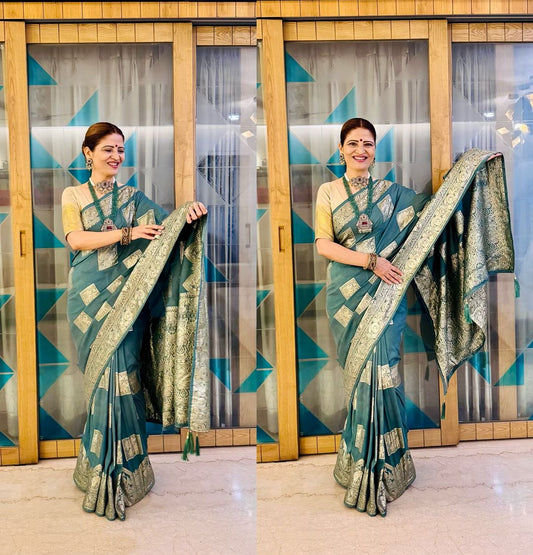 Elegant Teal Dola Silk Saree with Silver Zari Border and Butta Detailing